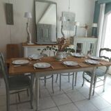 Farmhouse table with pearl gray base and raw wood top.