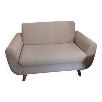 Small beige linen sofa