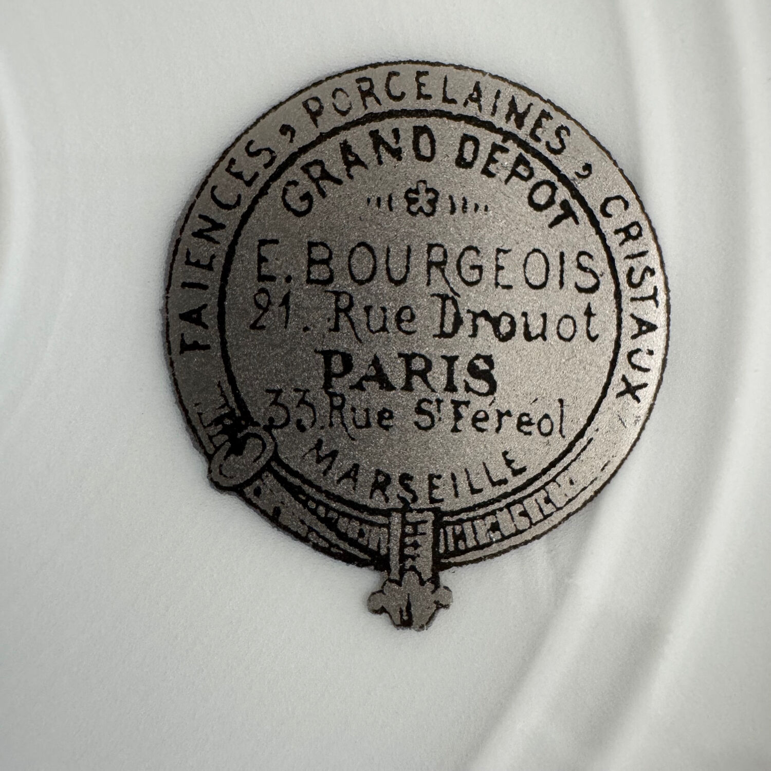 Set of monogrammed plates with gilt edges | E. Bourgeois | Late 19th century