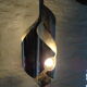 Hanging space age stainless steel
