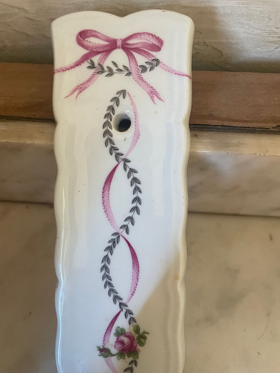 Pair of cut glass and Limoges porcelain wall sconces