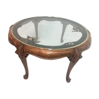 Circular coffee table in walnut and painted glass. 1950s.