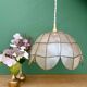 Vintage pendant light in mother-of-pearl and brass.