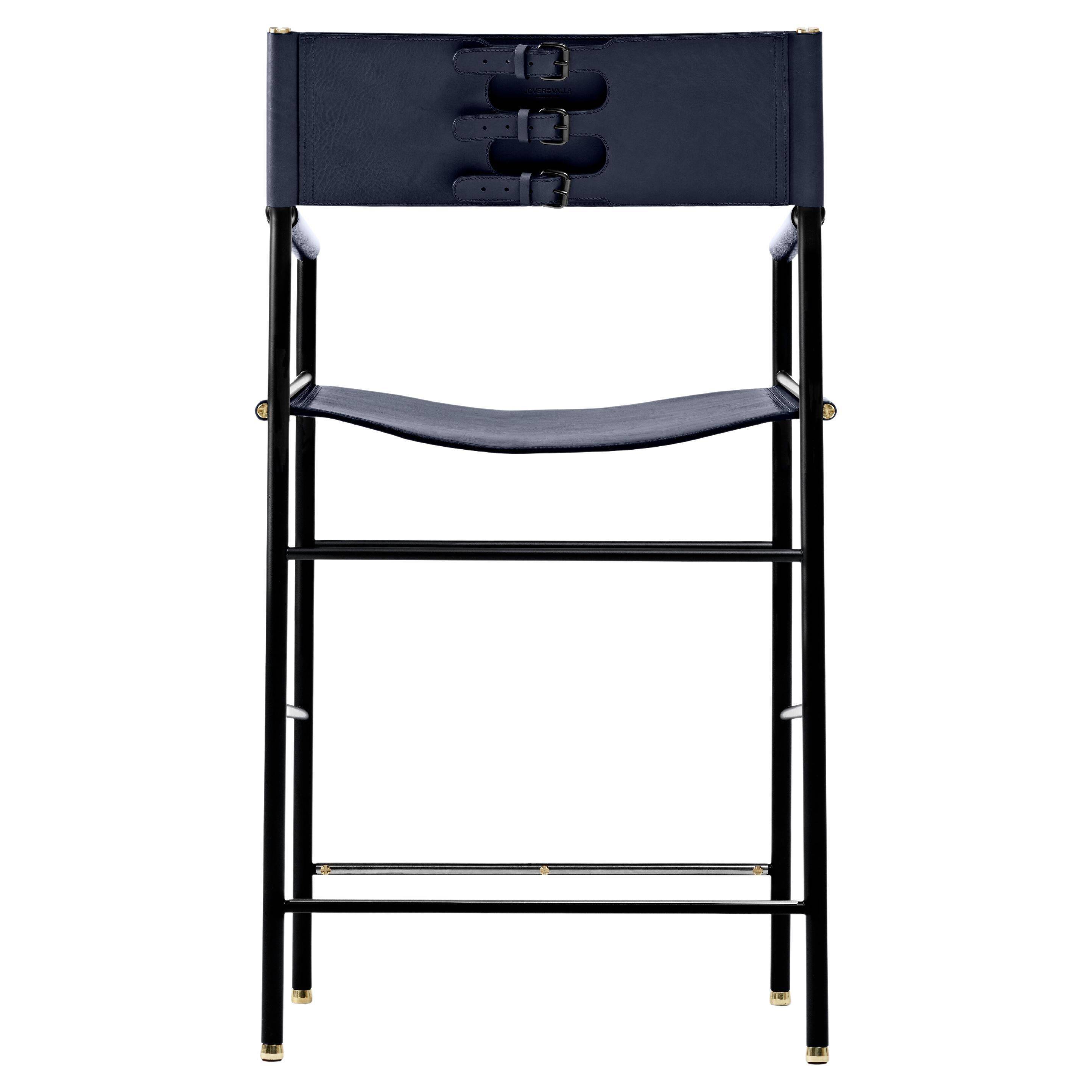 Contemporary classic bar stool with a navy blue leather backrest and black rubber metal.