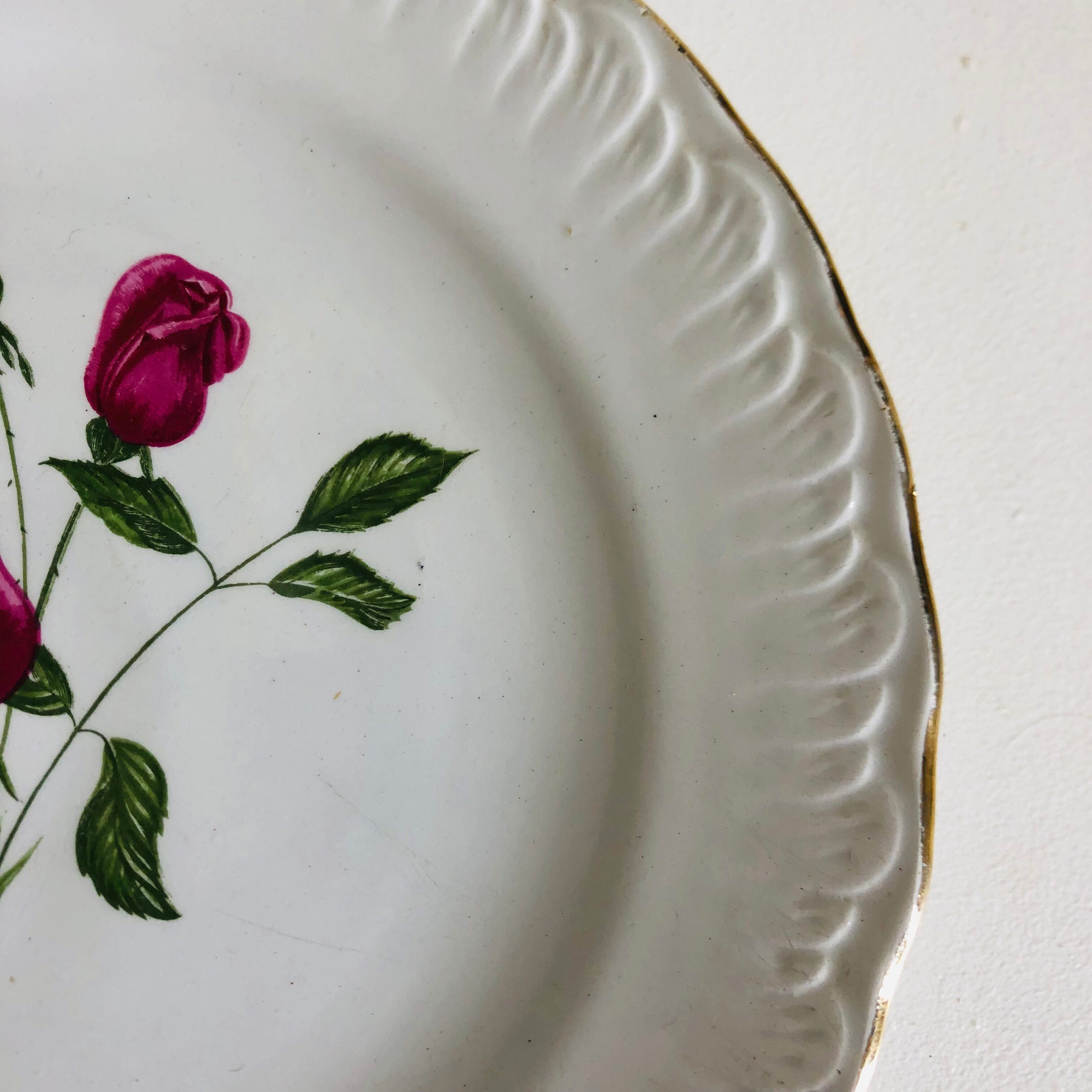 Plate by Amandinoise with a floral art deco rose motif.