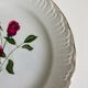 Plate by Amandinoise with a floral art deco rose motif.