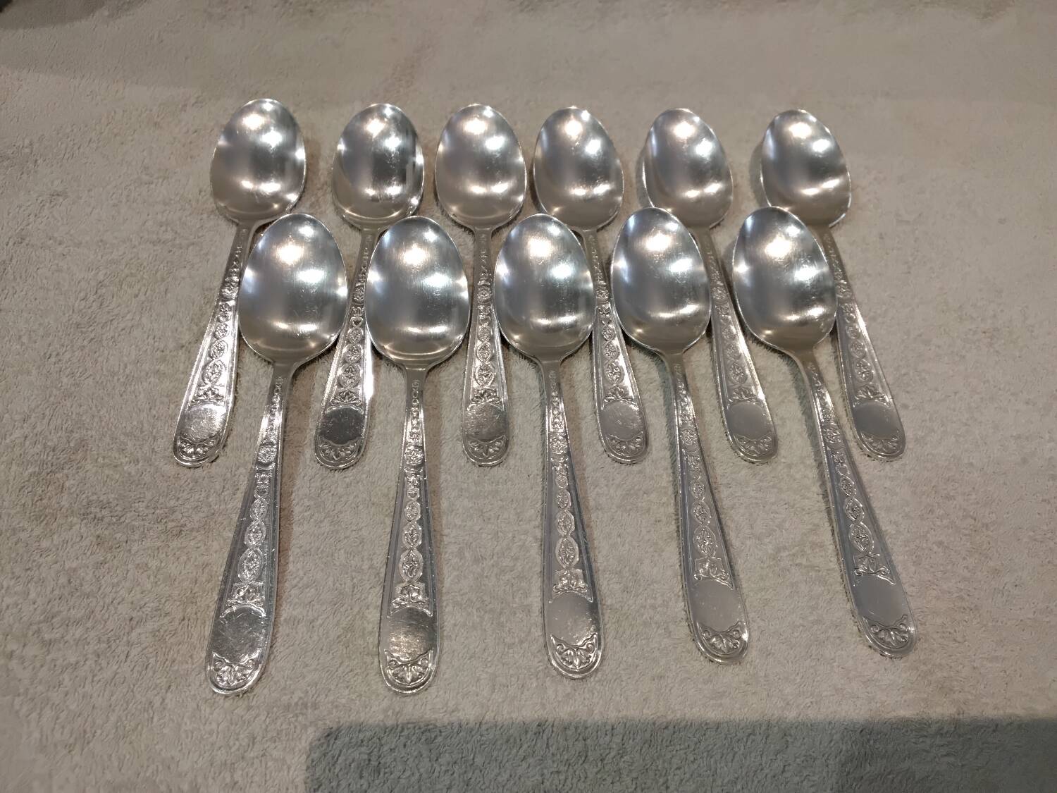 11 silver-plated soup spoons by Christofle Villeroy & Boch, striped
