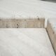 Series of 2 vintage travertine coffee tables published by Roche Bobois
