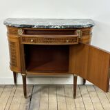 Half-moon commode in the Louis XVI style