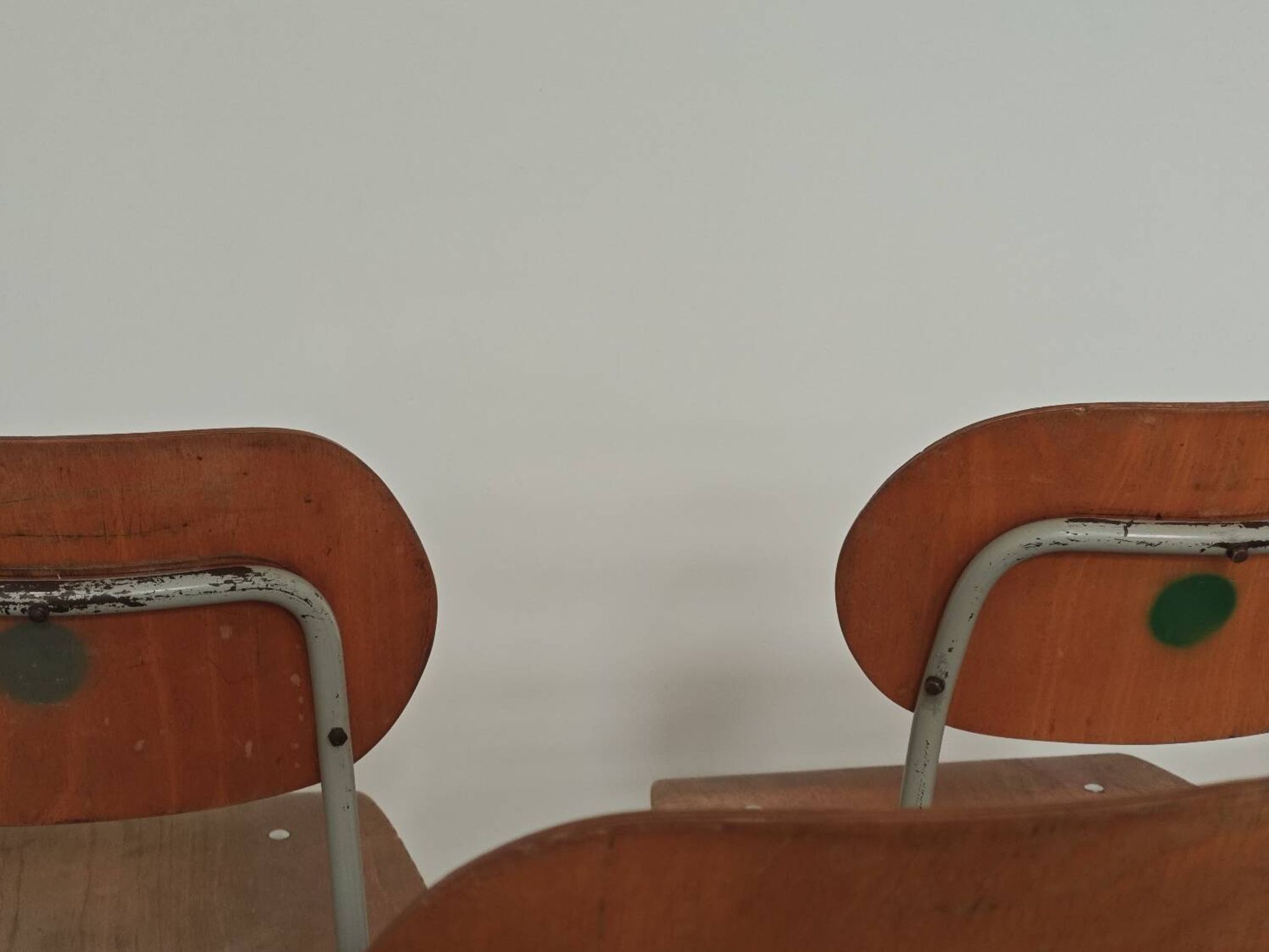 Set of 8 metal and wood school chairs  
Ex Czechoslovakia 1960