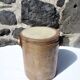 Trio of stoneware pots with lids