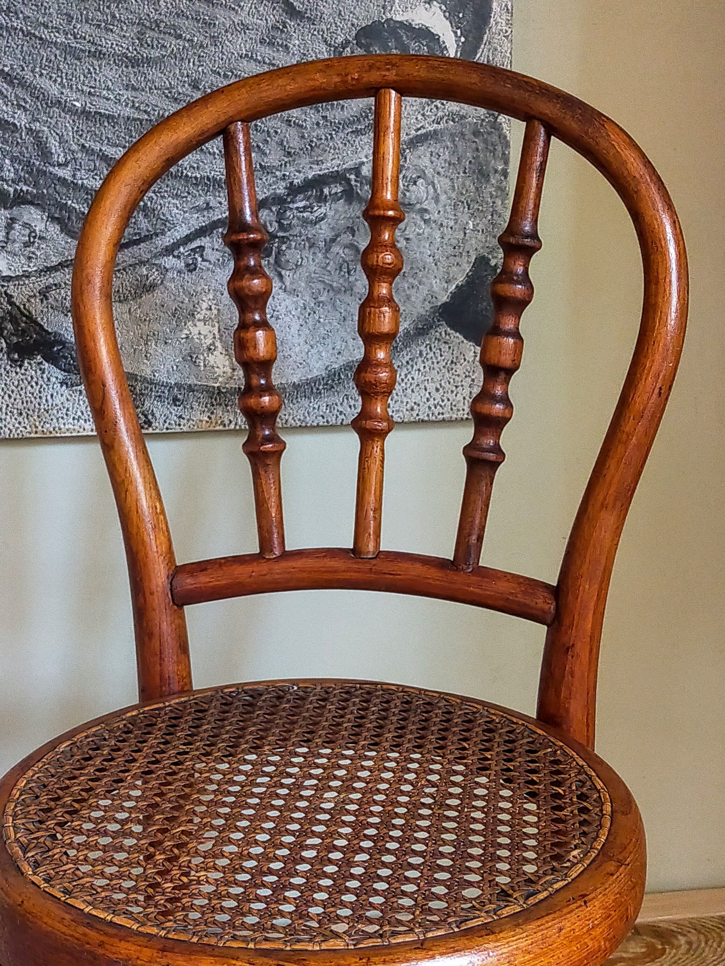 Children's chair in curved round wood old year