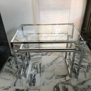 Nested tables in chrome metal and glass, Italy circa 1970.