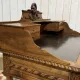 Louis XVI style desk from the late 19th century in walnut with a leather top.