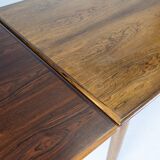 Dining table in rosewood with extensions of danish design from the 1960s