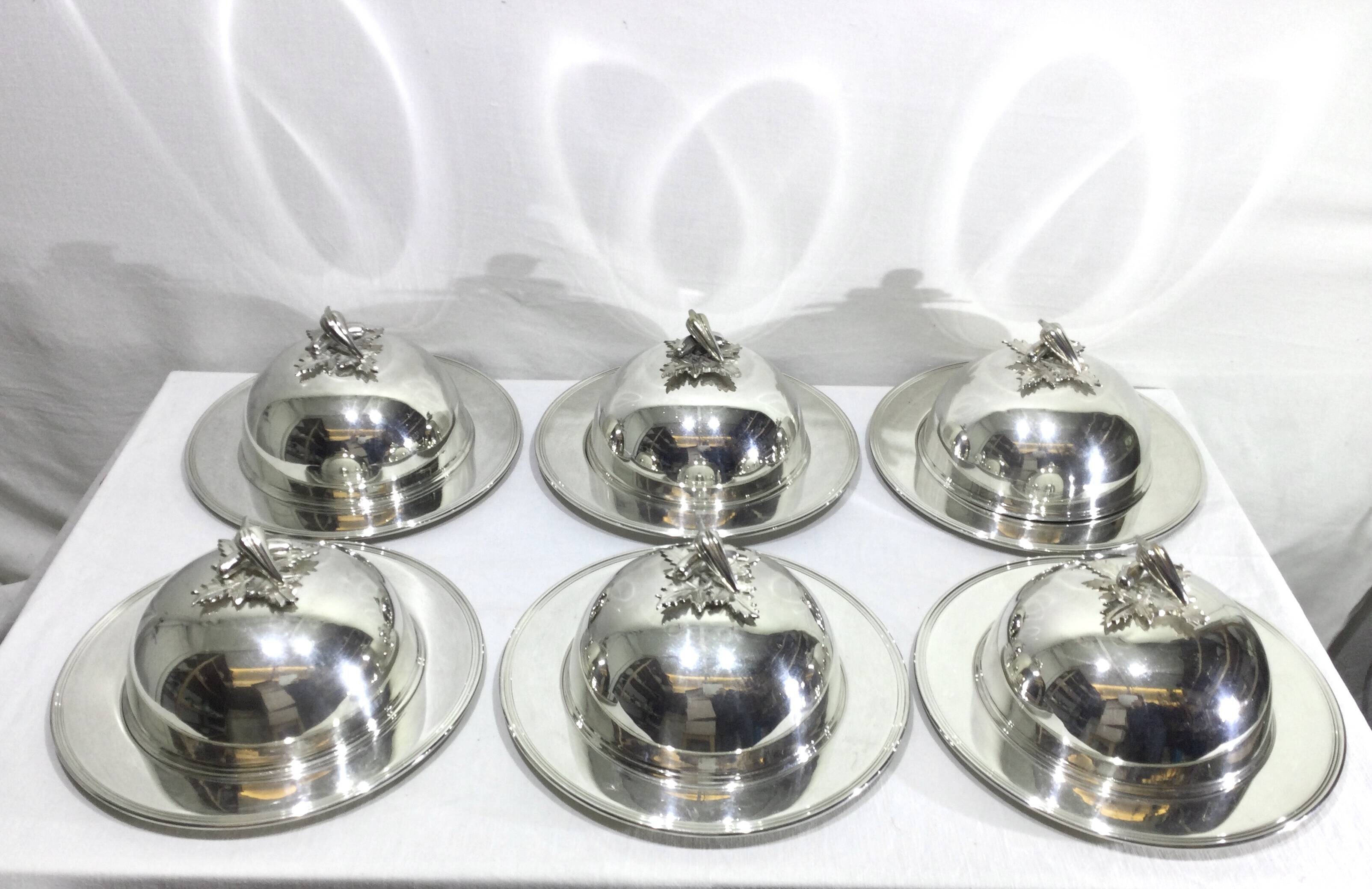Set of silver-plated serving dishes and bells