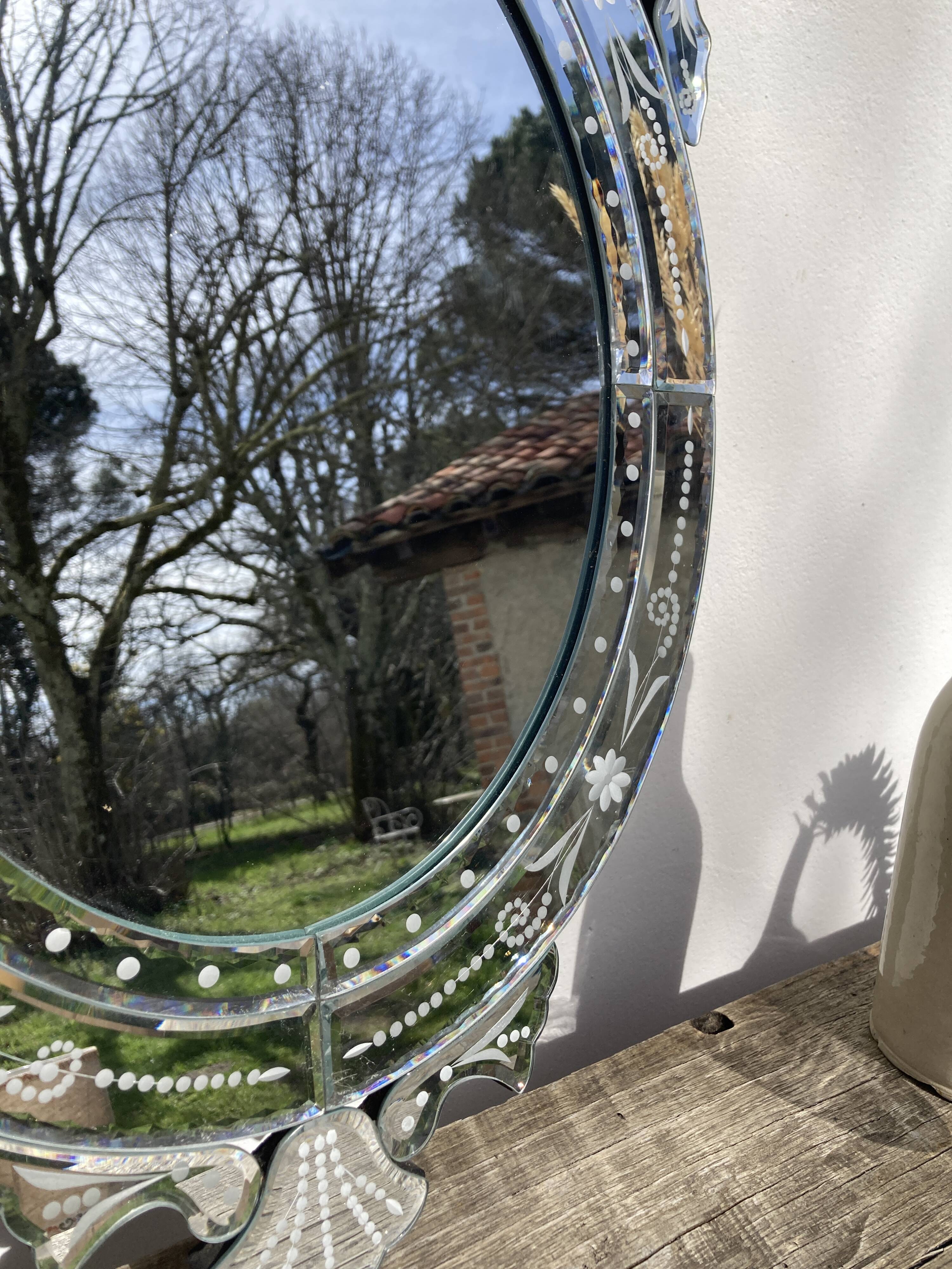 Oval Venetian wall mirror