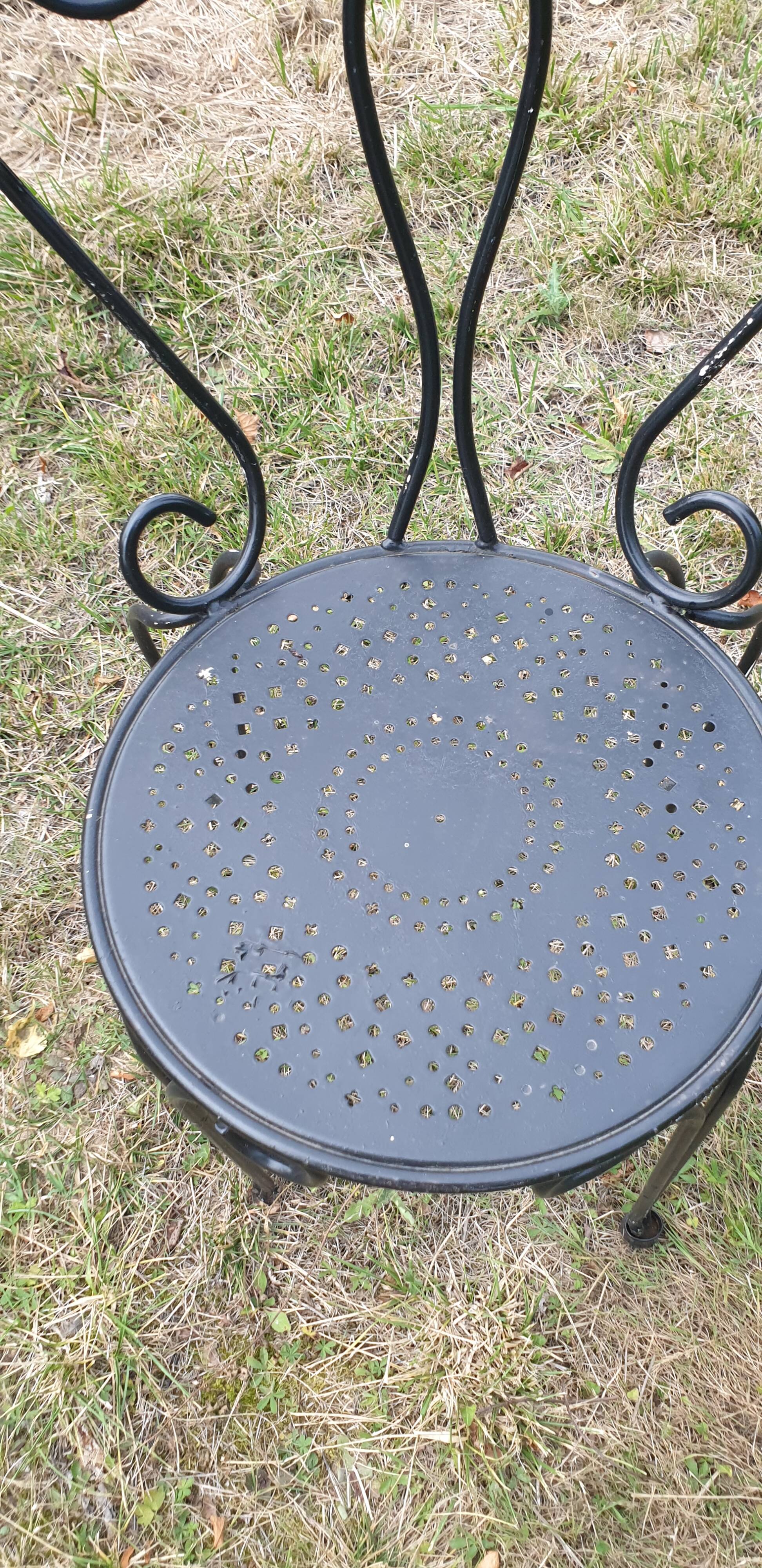 1 ornate wrought iron garden chair