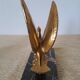 Pair of golden bird bookends on veined marble – Mid-Century vintage