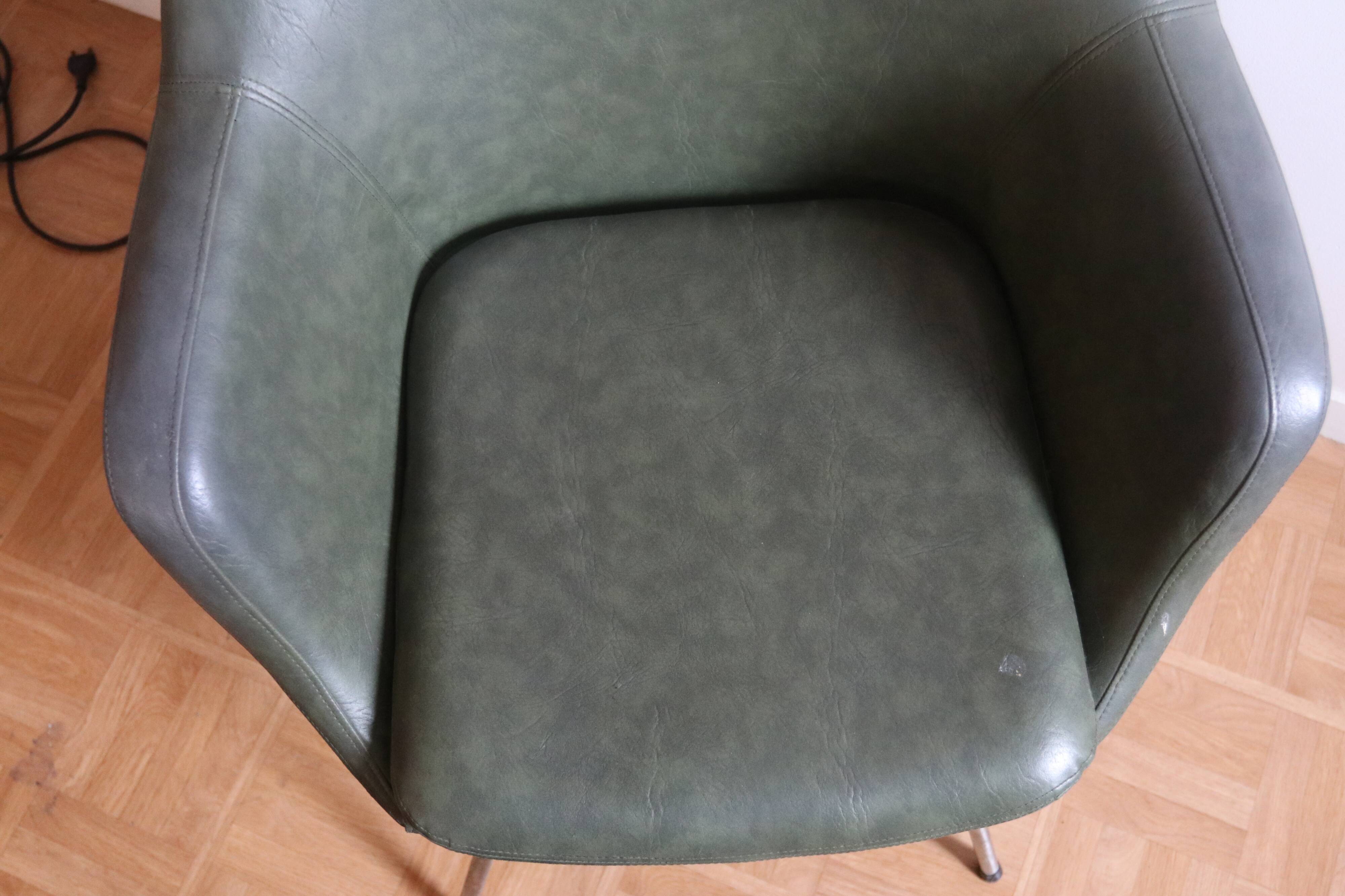 Three green skai chairs with chrome feet