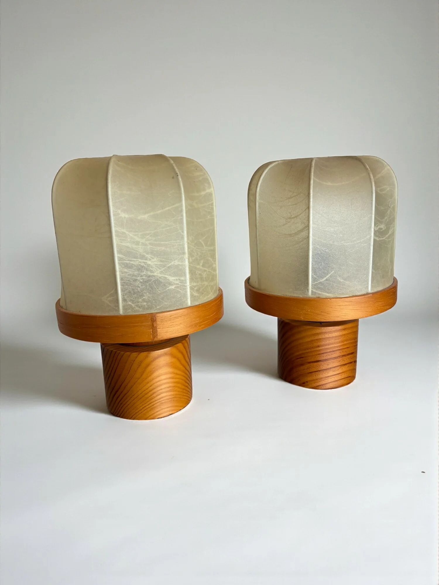 Pair of cocoon table lamps with pine, Italy, 1970s