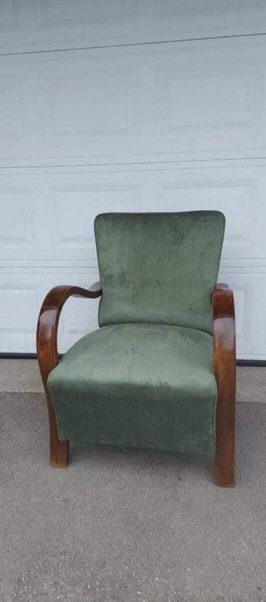 Set of 2 green Art Deco velvet armchairs, curved wooden frame, 1920s.