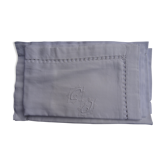 A pair of pillowcases monogrammed CD