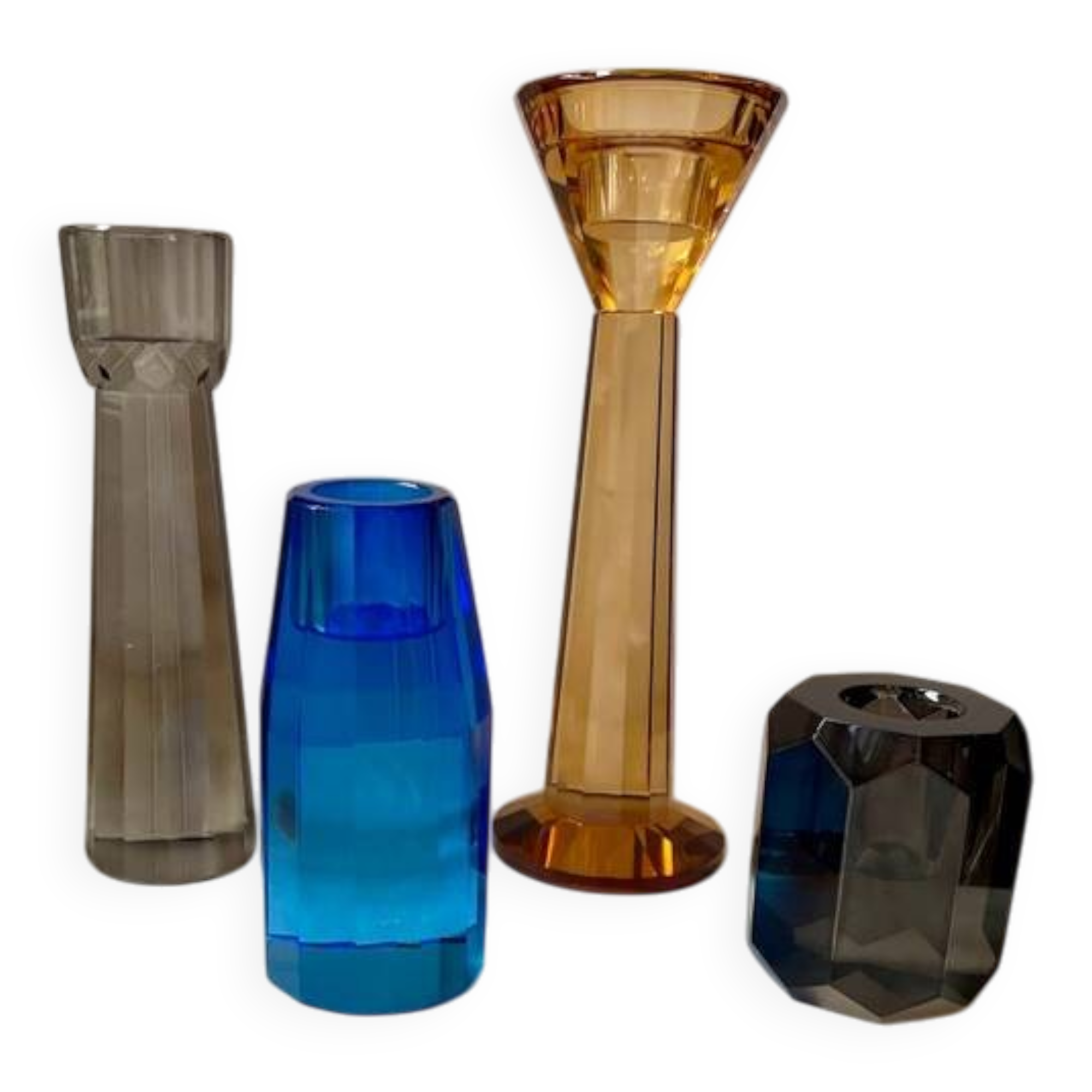 4 designer candle holders in colored glass