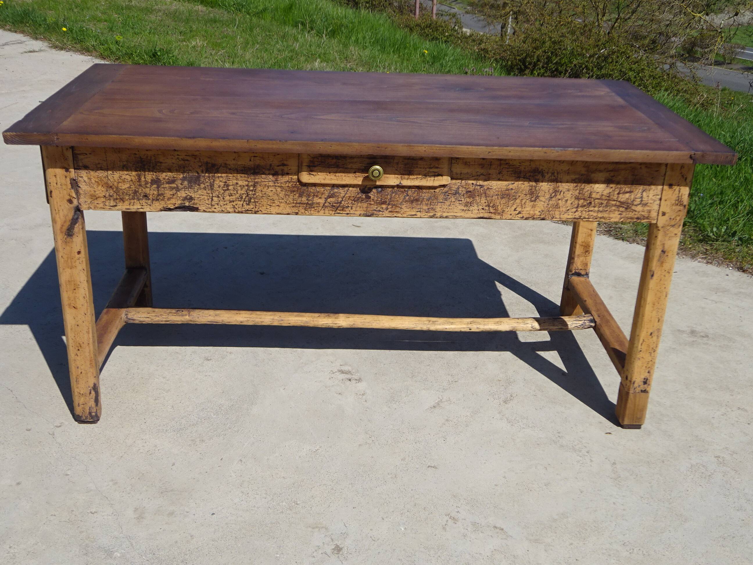 Old farmhouse table made entirely of restored solid oak.