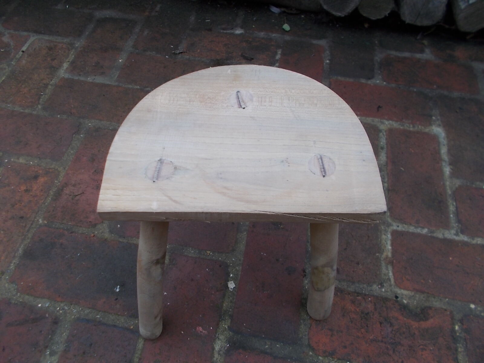 Raw wood tripod stool