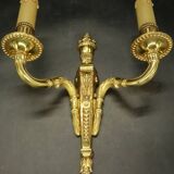Pair of Louis XVI style urn and torch wall lights - gilt bronze
