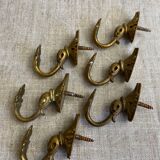 Old bronze coat hooks
