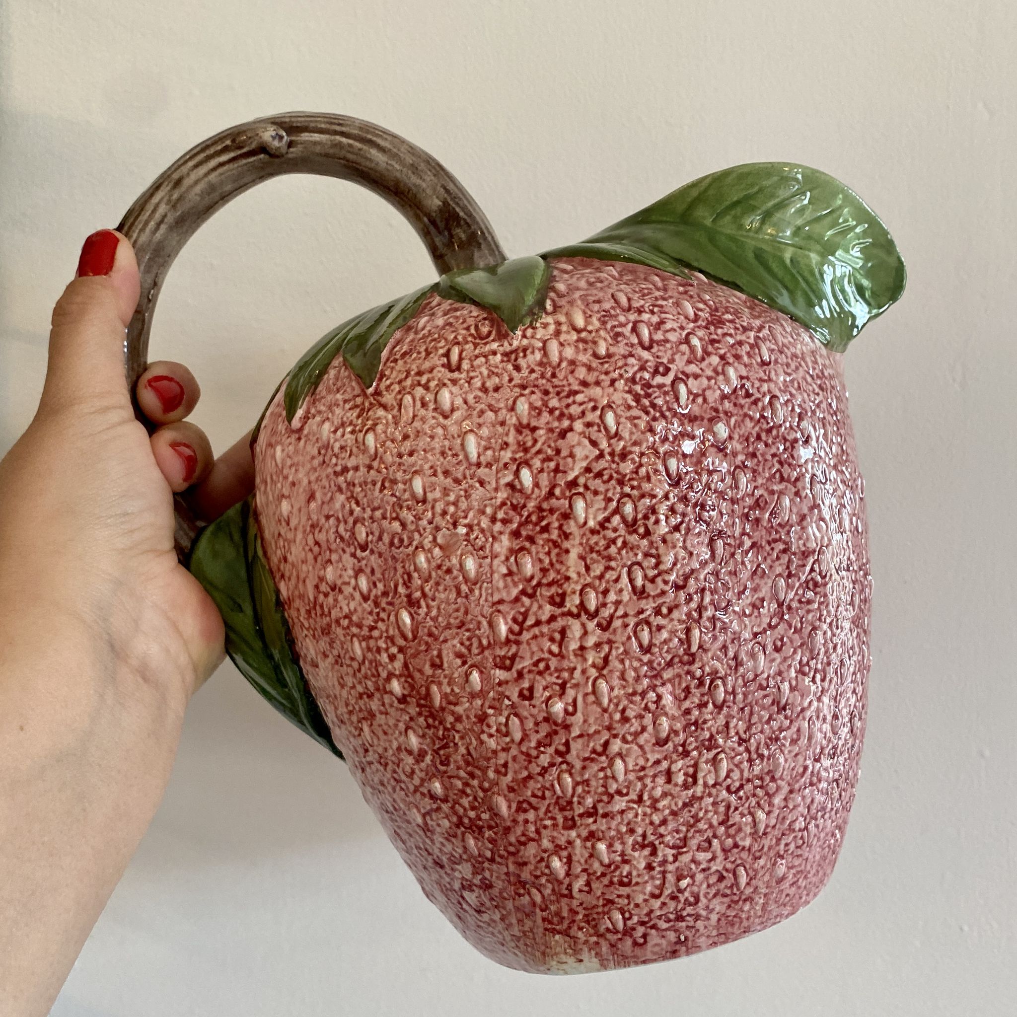 Set of ceramic fruits, a strawberry decanter and two lemon and pineapple jam jars