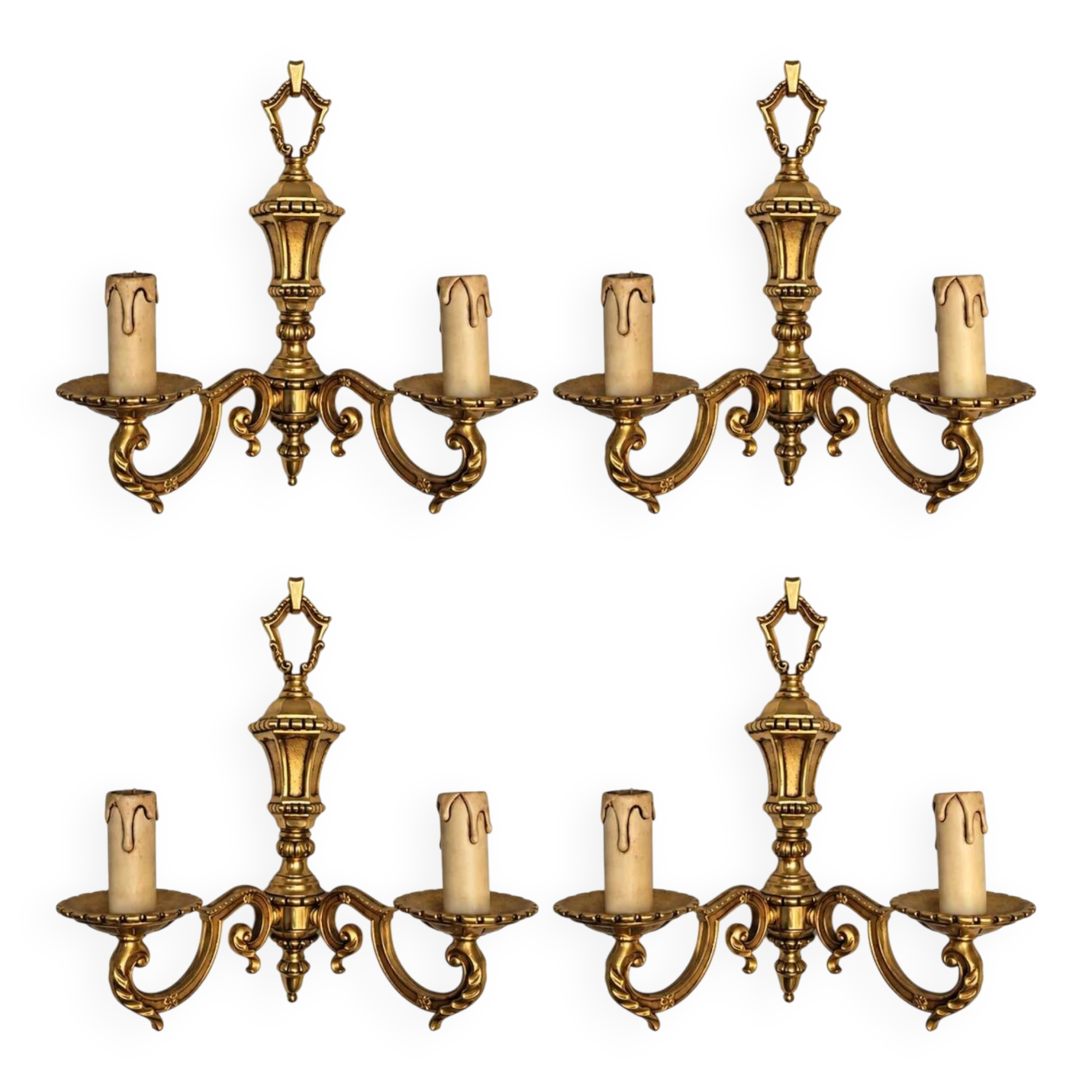 Set of four two-light wall sconces in gilded brass — Louis XVI style