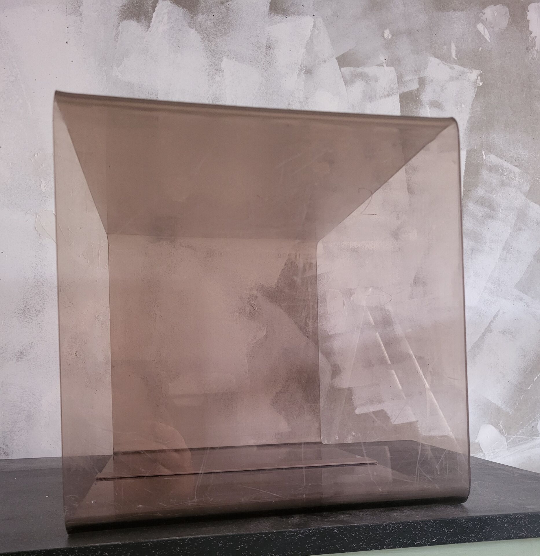 Rectangular piece of furniture or coffee table in smoked plexiglass by Michel Dumas.