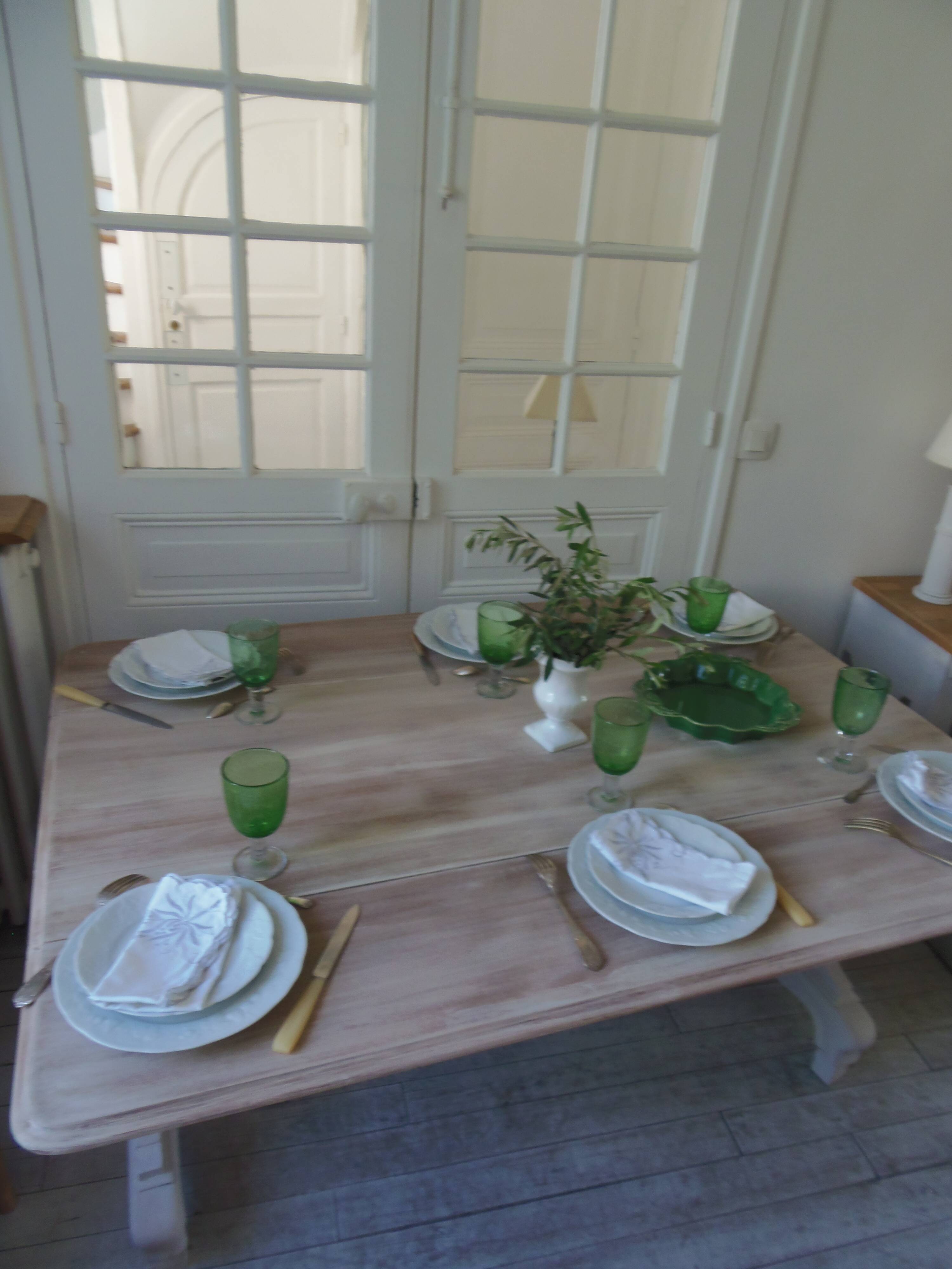 Console, solid walnut table, foldable extensions, grey patinated legs.