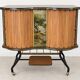 Vintage bar on wheels with tambour doors and painted decor – 1950s.