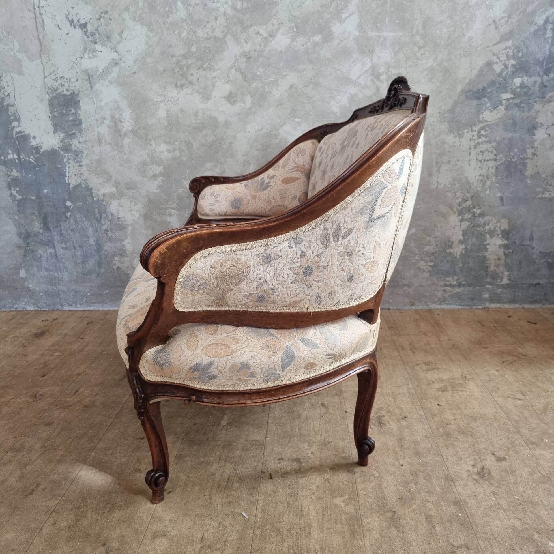 Small sofa or bench in Louis XV style, rococo.