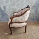 Small sofa or bench in Louis XV style, rococo.