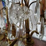 Pair of bronze girandoles with crystal pendants, two arms of lights.