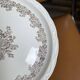 12 Digoin plates with brown flowers