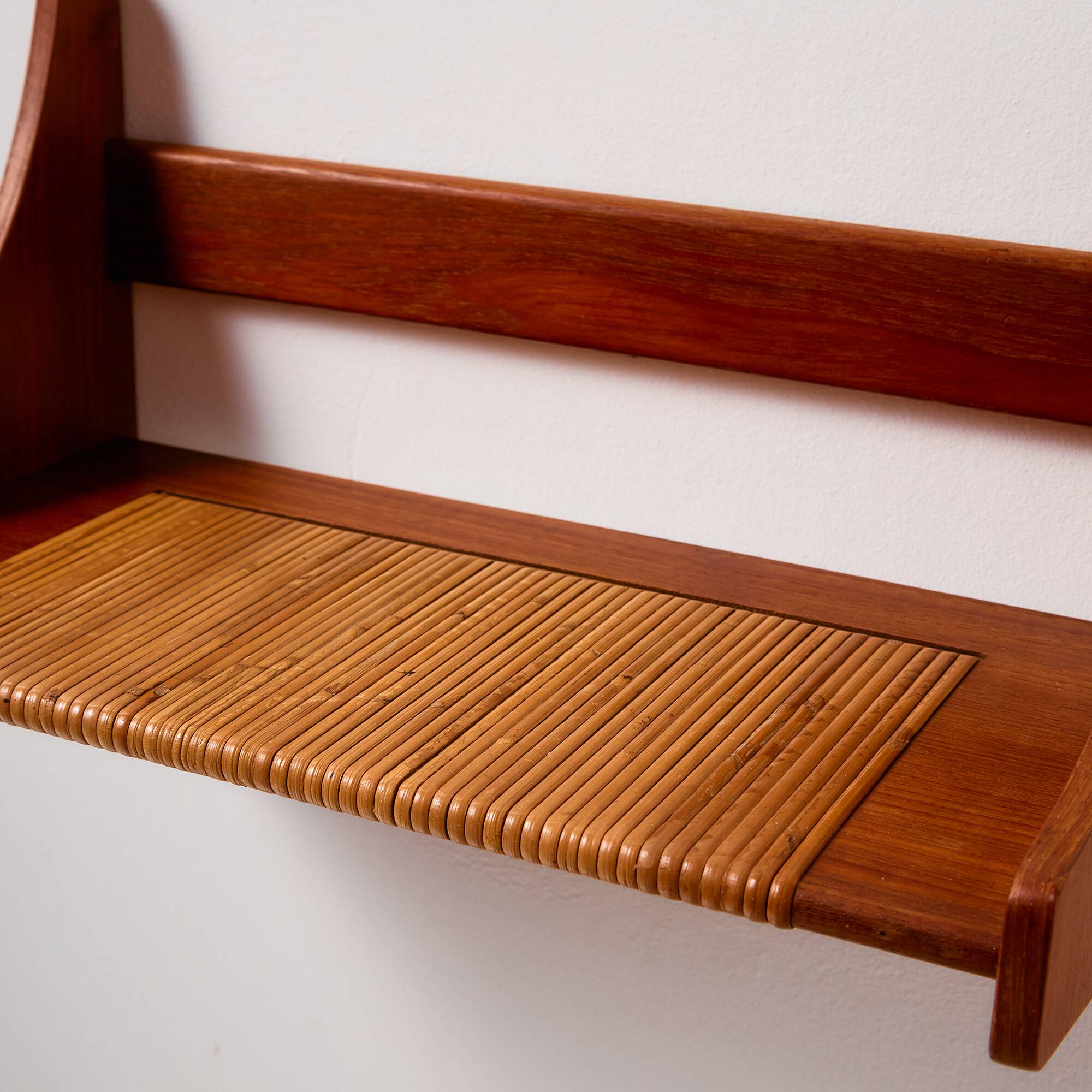 Teak wall shelf with cane details