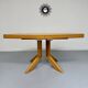 Ancienne table en bois massif octogonal a rallonge design Girsberger