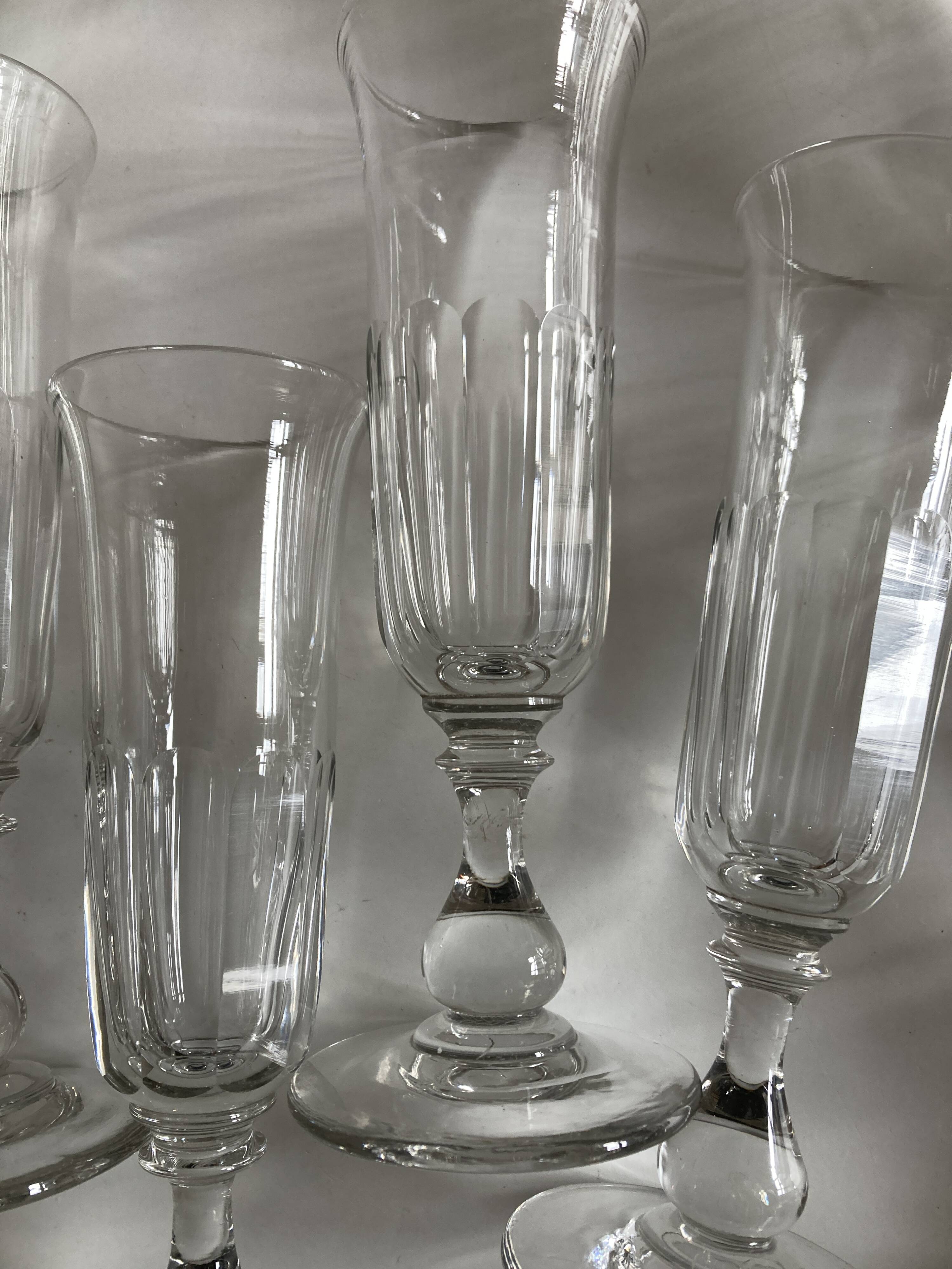 Set of 9 Louis Philippe tulip champagne flutes with flat sides mid 19th