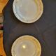 16 flat gold plates from Orchies porcelain