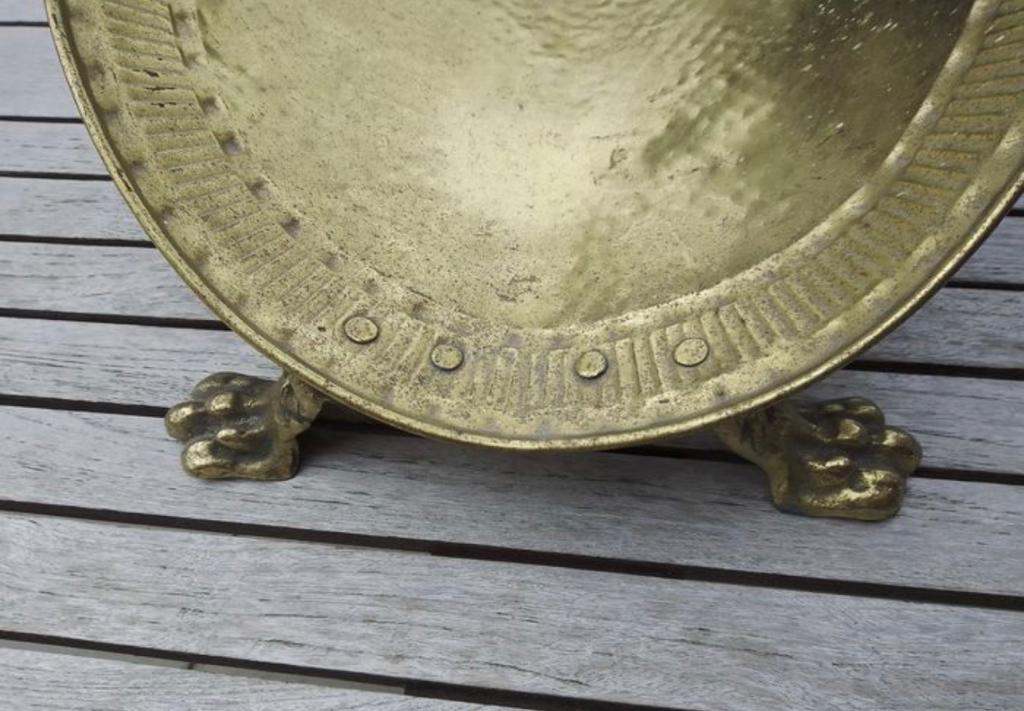 Old brass log holder