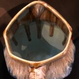 Enamelled ceramic broc