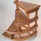 Library spiral staircase in beech and brown leather.