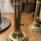 Pair of 19th-century brass pusher candlesticks