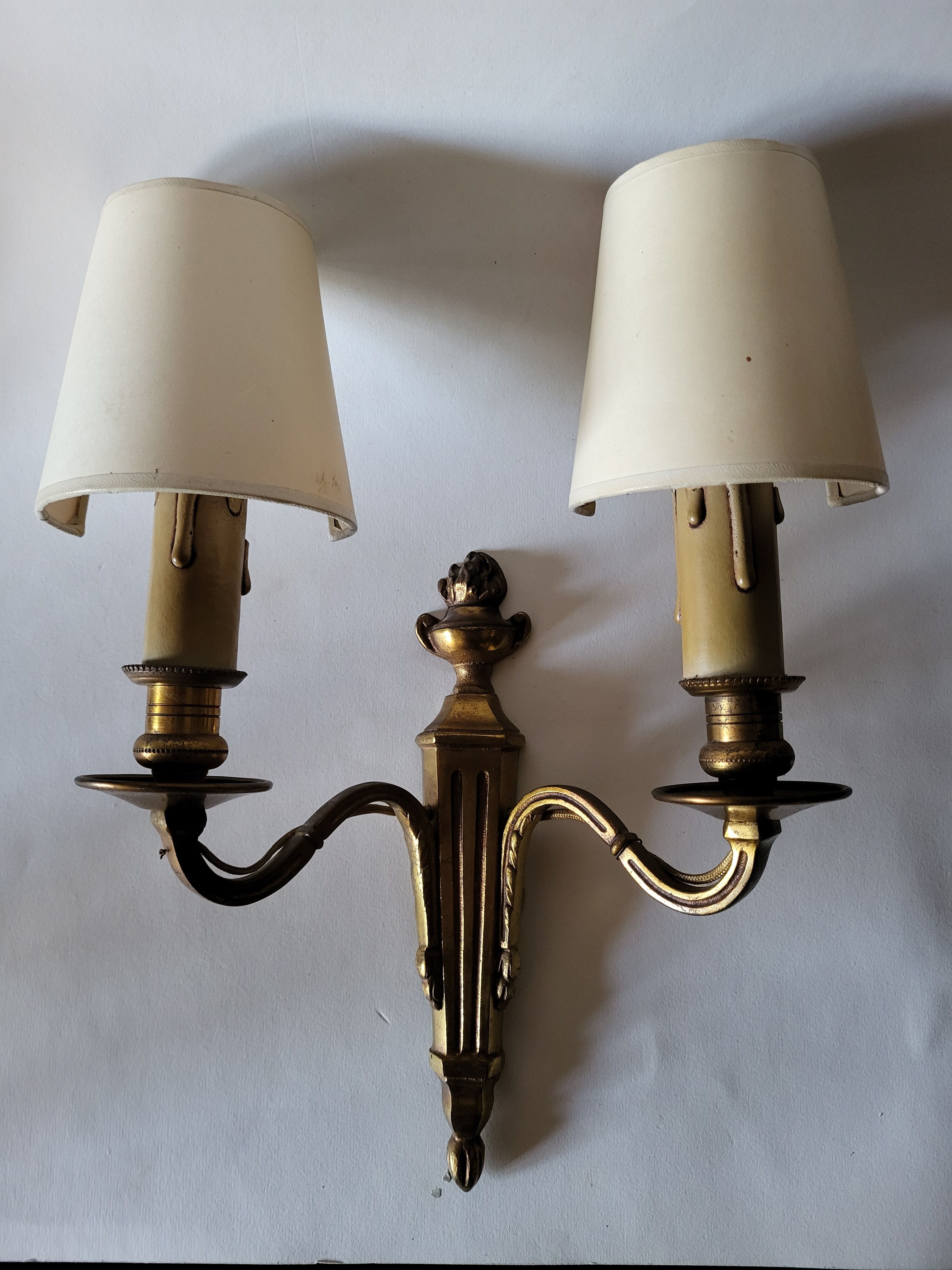 Pair of antique gilded iron wall lamps